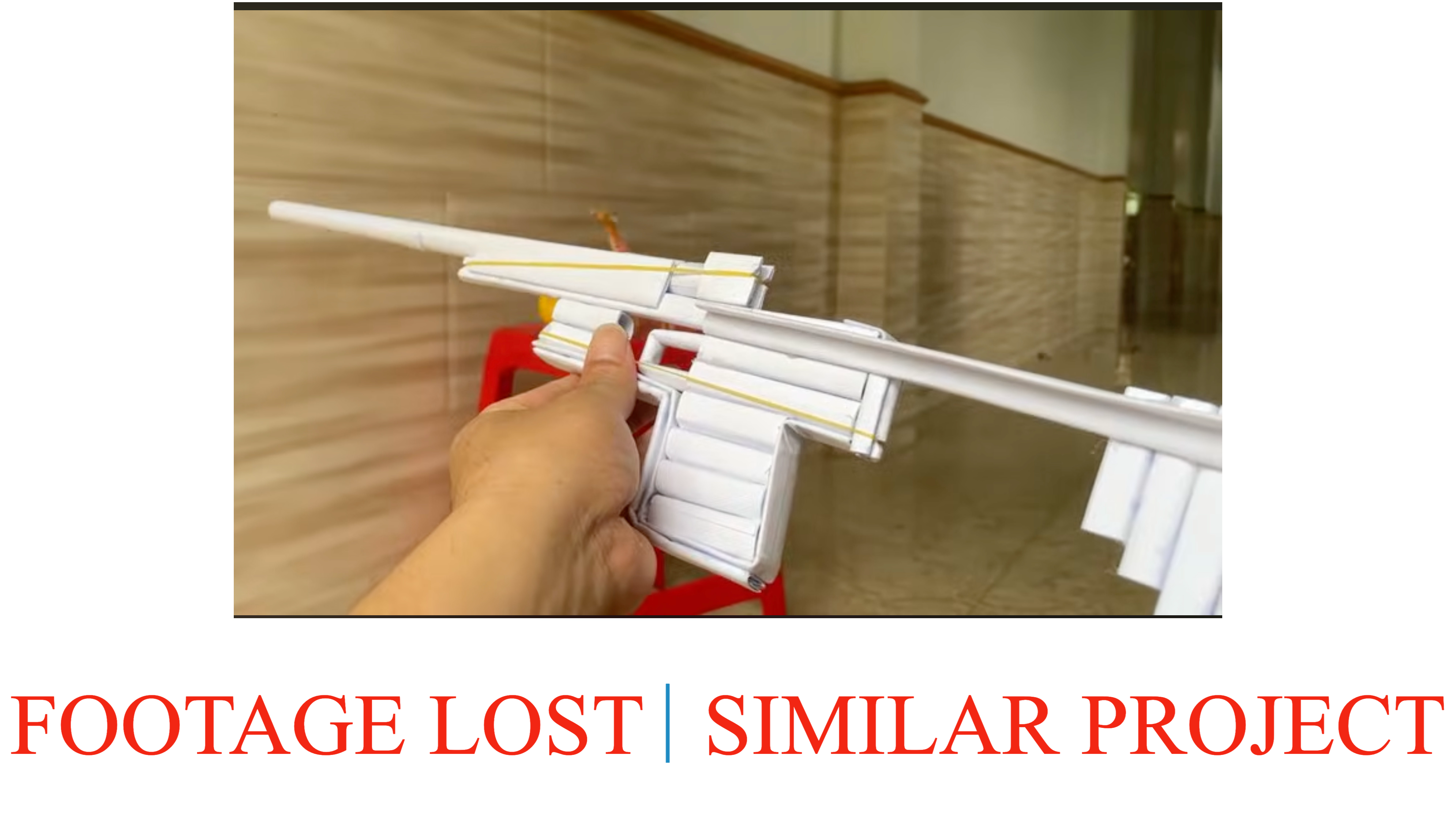 Rubber-Powered Paper Gun